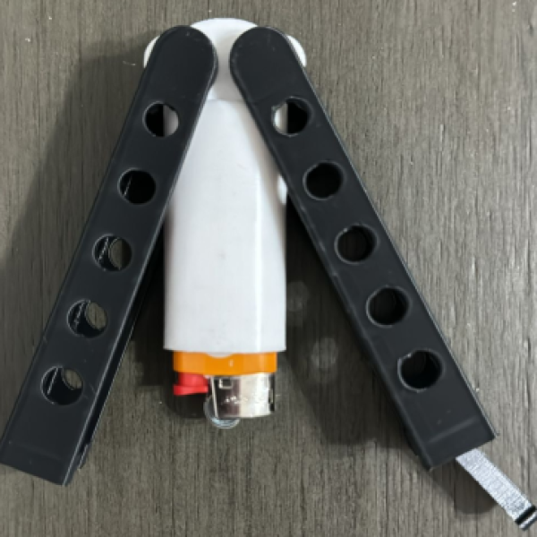 The FlipFlick: Balisong Butterfly Mini Bic Lighter Sleeve