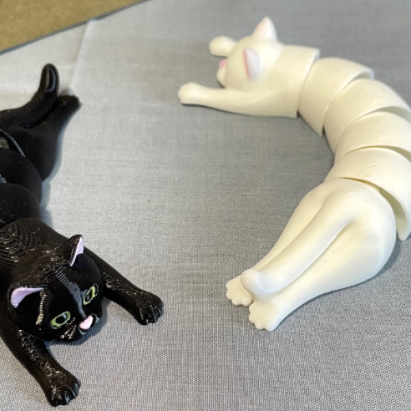 The Cuddle-Cat: Articulated Flexi-Holding Cat