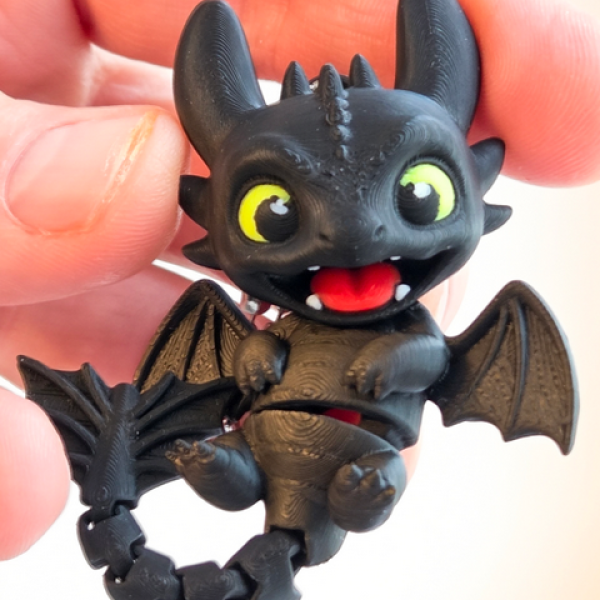 The Midnight Companion: Articulated Toothless Dragon Keychain