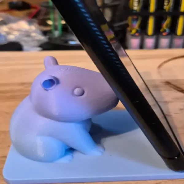 The Chillest Desk Companion: The Zen Capybara Smartphone Throne