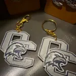 Ohio County Eagles Fan Bundle – Keychain, Spinner Necklace, Earrings & Koozies